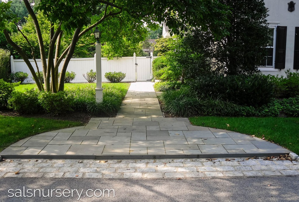 Large pathway with rounded edges and variety of materials
