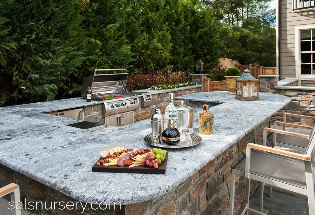 Large Outdoor Kitchen and Grill Station with Bar Seating