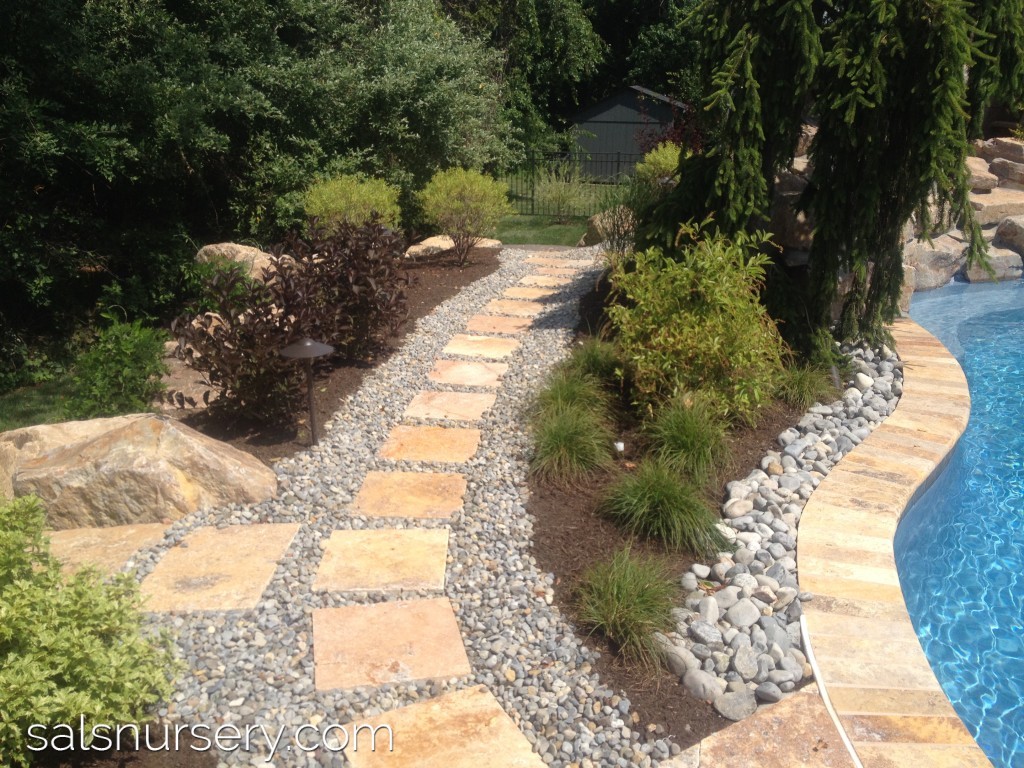 Outdoor pathway with gravel and pavers
