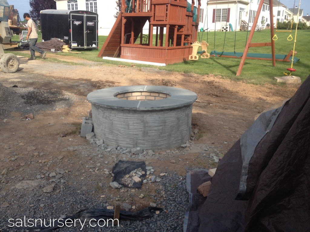 Construction of an outdoor fire pit and patio